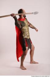 Man Adult Average White Fighting with spear Standing poses Casual